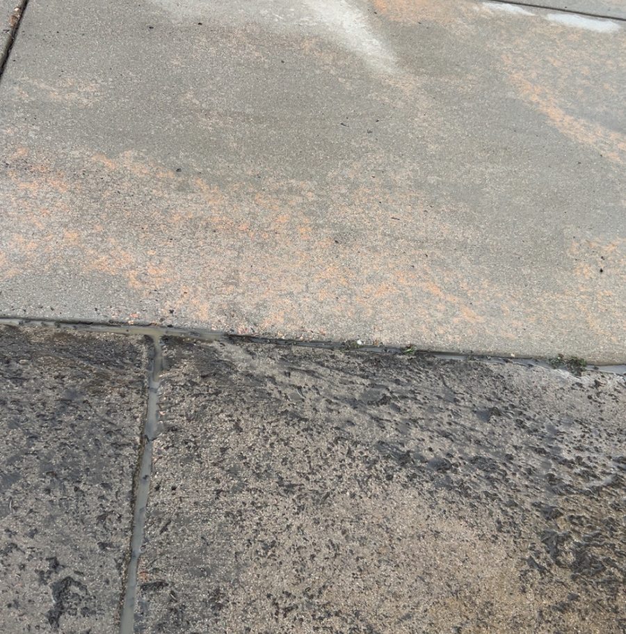 Driveway pressure washing before and after in Centennial, CO